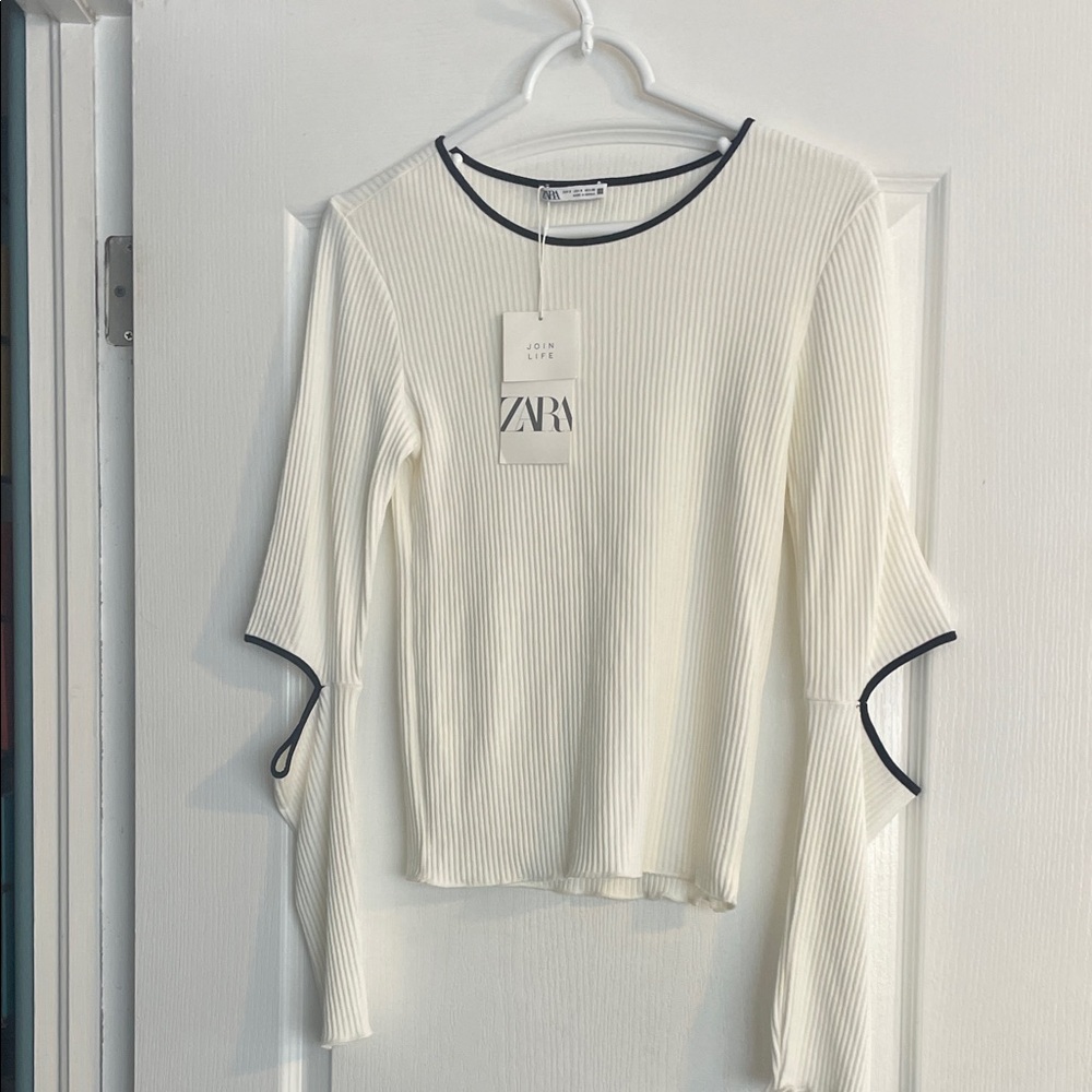 Zara Cream Ribbed Top with Black Trim and cut out elbows